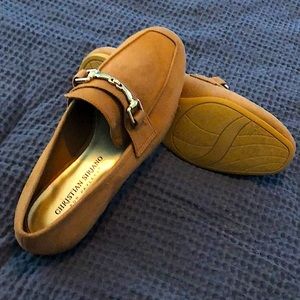 Christian Siriano shoe with buckle.